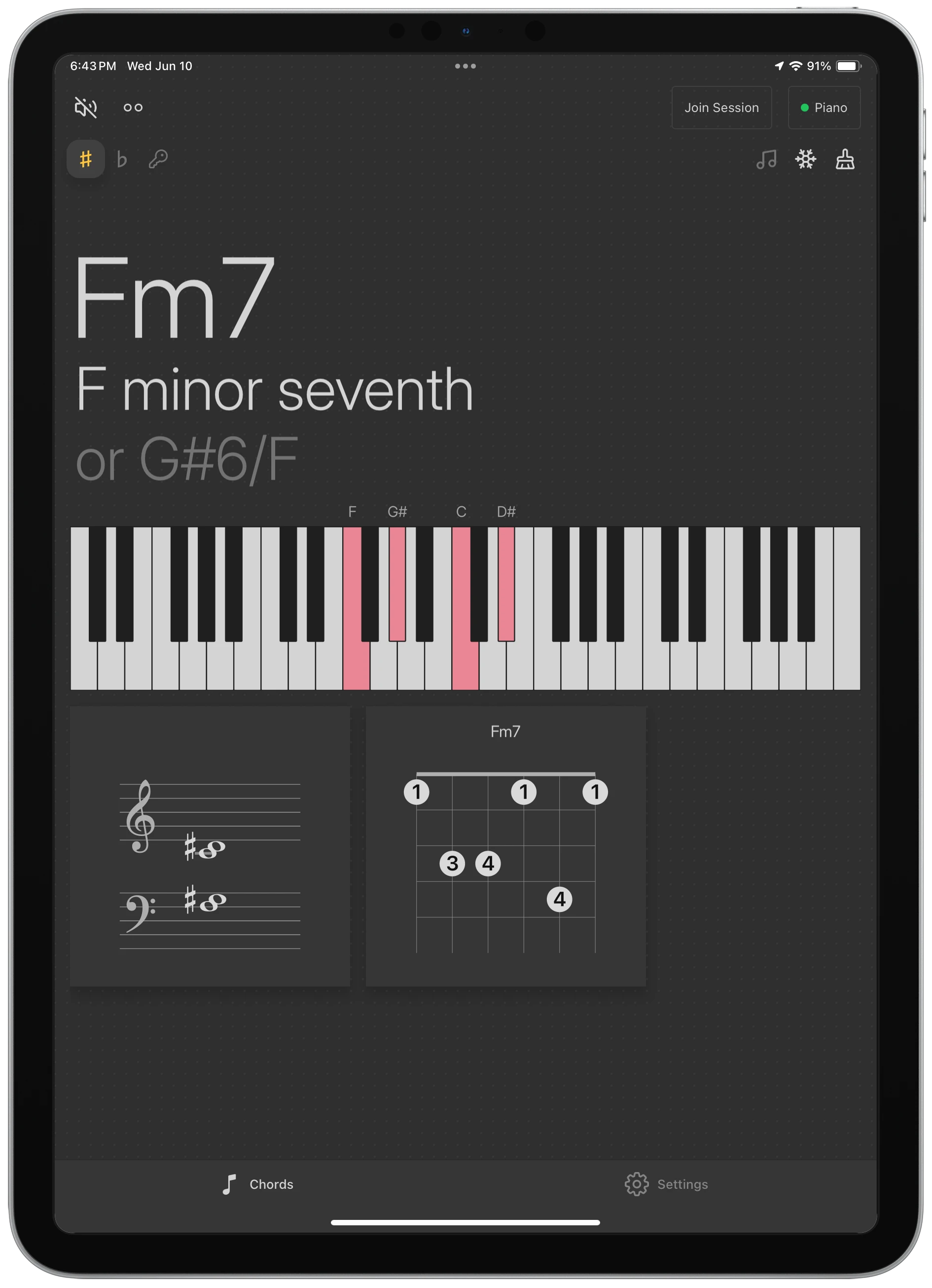 Reflection on an iPad showing a chord, its notes, and a scale